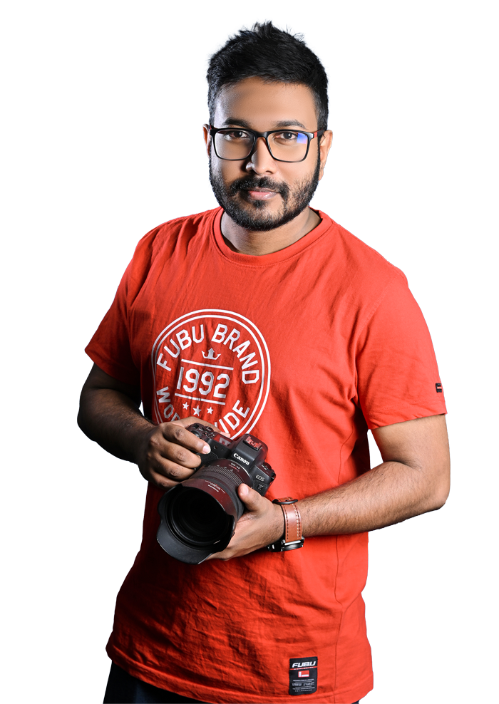Pasindu Dias, professional photographer and videographer in Sri Lanka, holding a camera